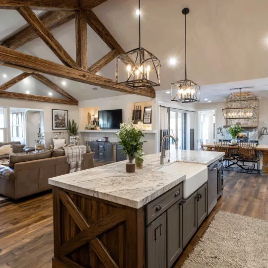 open concept barndominium interior kitchen living room vaulted ceiling modern layout design