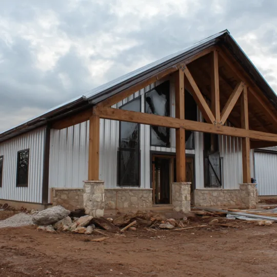Post Frame Barndominium Under Construction With Timber Entry